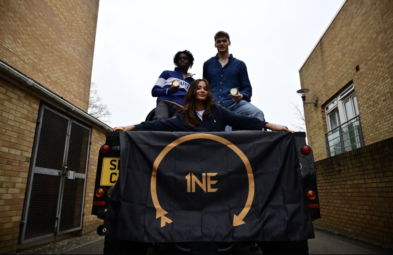 1NE founders with branded Land Rover
